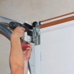 Fixing Garage Door Springs, Tracks, and Openers with Ease