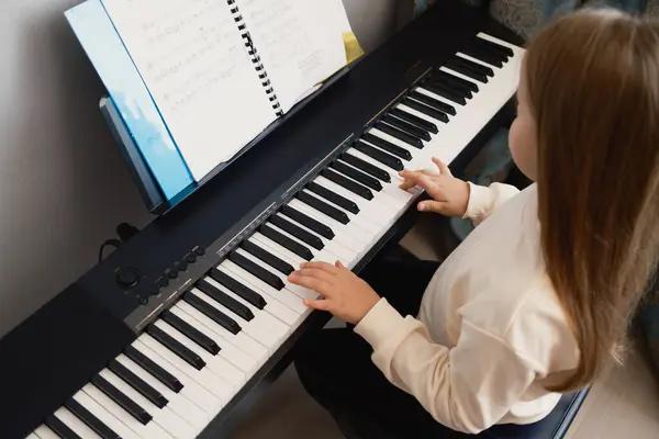 Discover How Home Piano Lessons Support Academic Development and Social Growth